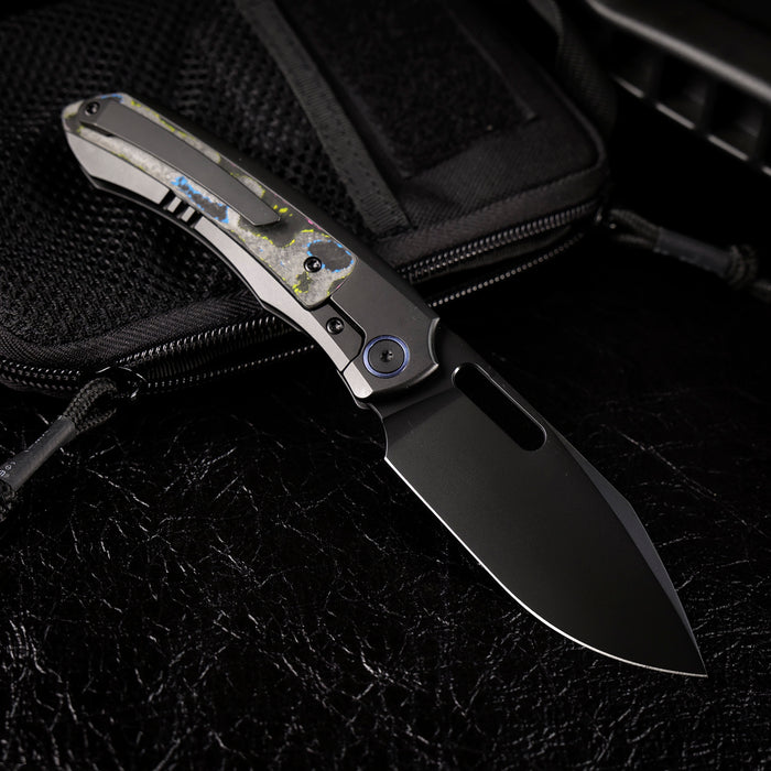 Remette ORCAURD RT-Orca (M390, Drop Point, Pearlescent DLC, Titanium & Ultimate Warrior CamoCarbon, Button Frame Lock) Folding Pocket Knife