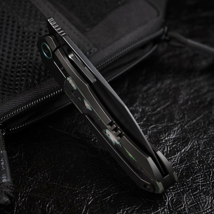 Remette ORCAKDD RT-Orca (M390, Drop Point, Pearlescent DLC, Titanium & Kelp Bed CamoCarbon, Button Frame Lock) Folding Pocket Knife