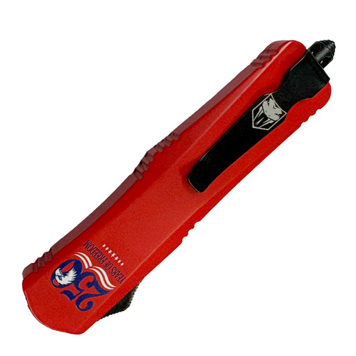 Red multi-tool with a black handle on a white background