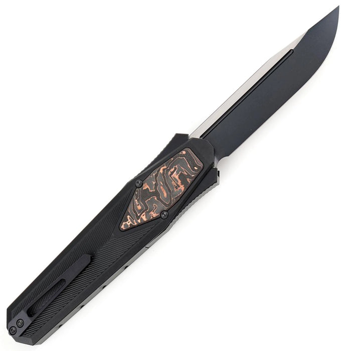 Black folding knife with a decorative handle on a white background