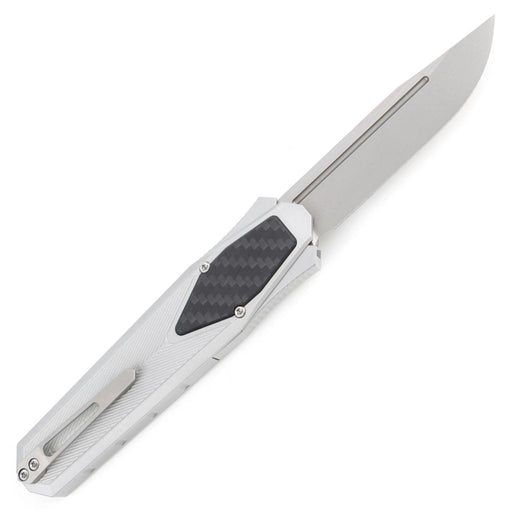 Folding knife with a metallic blade and handle on a white background